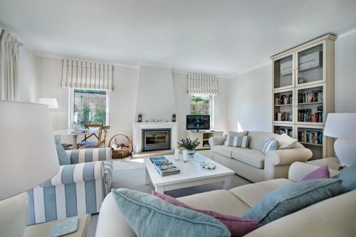 Spacious living area with wood burning stove for the winter nights